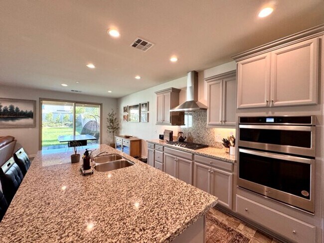 Building Photo - Welcome to this stunning two-story home lo...