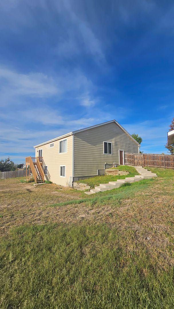Building Photo - $2700 | 4BR/2.5BA | Pet Friendly House wit...