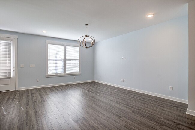 Building Photo - Corner Townhome with Roof Top Deck in Down...