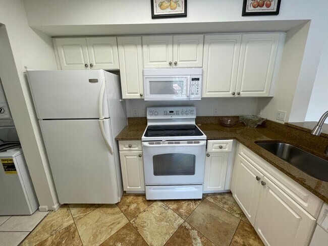 Building Photo - ANNUAL RENTAL - 2ND FLOOR 1 BED / 1 BATH C...