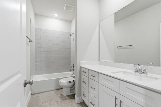 Building Photo - "Open-Concept 4-Bedroom, 2.5-Bath with Designer Finishes and Peaceful Greenbelt Views!"