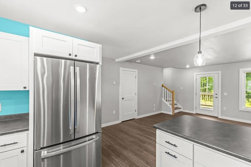 You can be in the kitchen but not miss any action happening in the living room, 'cuz open floor plan - 24 Wilsons End Pl