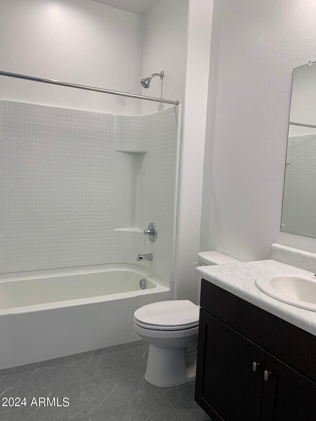 Building Photo - 345 E Caribbean Dr