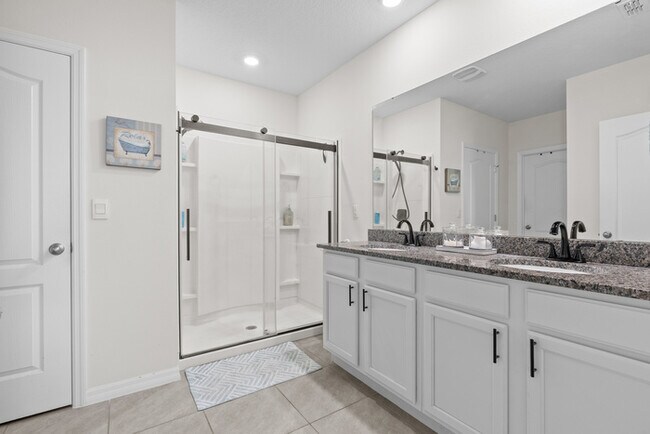 Building Photo - 4BR Under $2,300/mo | Tesla Charger | 15 Min to Lake Nona