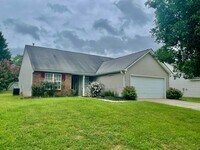 Building Photo - Must see this Adorable 3 bedroom 2 bath 2 garage home . Located in the Reedy Creek Plantation