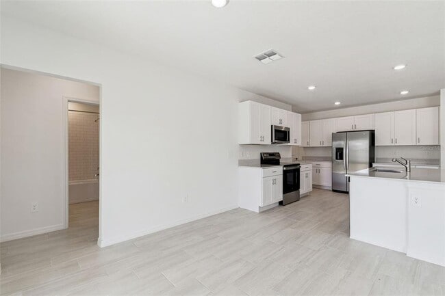 Building Photo - 1712 Tropical Oasis Ave