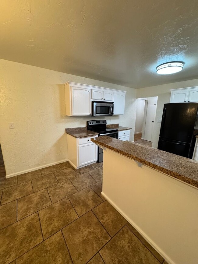 Building Photo - Winston 3 bedroom 2 bath with large storage shed and carport