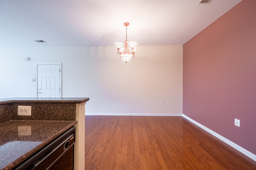 Dining area with hardwood floors - 539 Sophee Ln