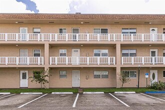 Building Photo - 608 SW Natura Blvd