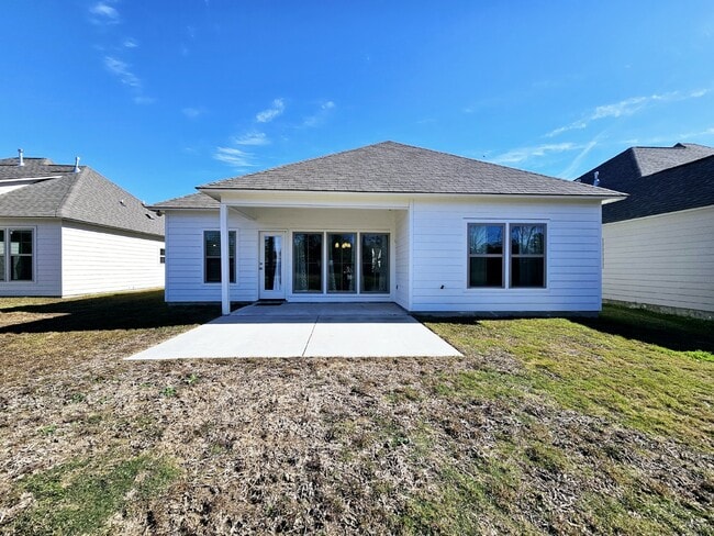 Building Photo - Stunning 4-Bedroom Waterfront Home with Granite Countertops and Hardwood Floors in The Sanctuary ...