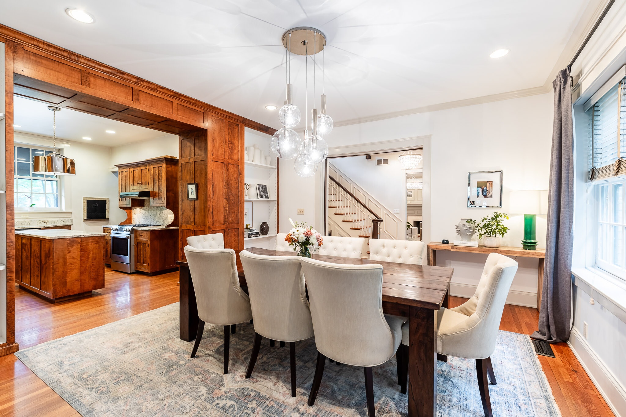 Foyer opens to Kitchen and Dining Rooms via pocket doors. - 4061 Beechwood Ave