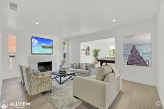 Building Photo - Fully Renovated 4-Bedroom Home with Firepl...