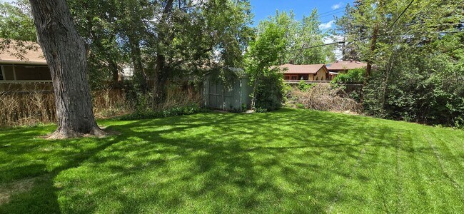 Building Photo - Spacious Ranch-Style 5BR Home w/ Finished Basement & Large Fenced Yard