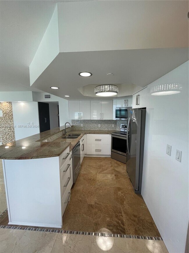 Building Photo - 8911 Collins Ave
