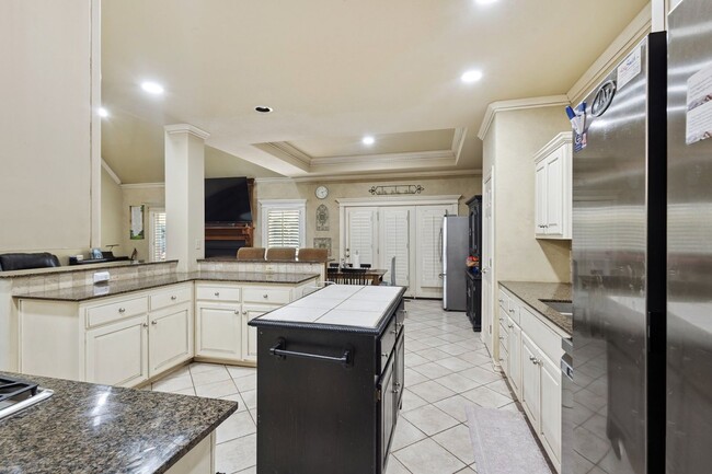 Building Photo - 4 Bedroom + Bonus Room & Office with Gorgeous Pool