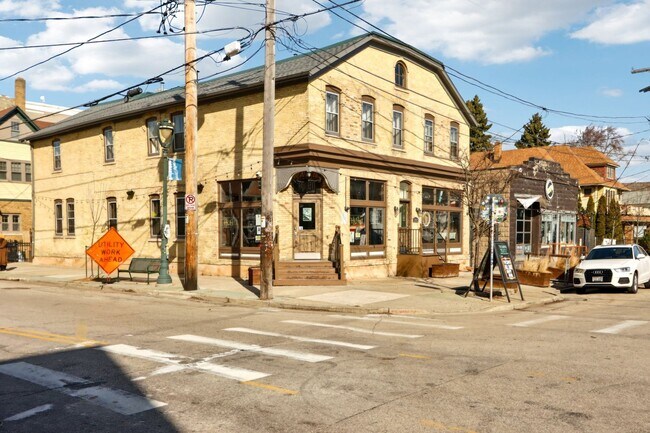 Building Photo - ? Steps from Brady St! Bright 2BR with FREE Laundry & Pet-Friendly Living