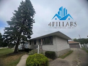 Building Photo - "Charming 3-Bedroom Haven with Finished Basement & Gleaming Hardwood Floors in Hammond!"