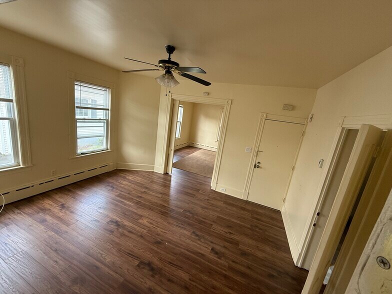 Living room view of 1 bedroom w/pocket doors - 224 E Main St