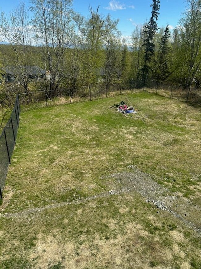 Building Photo - Gorgeous Log Home with infloor heat.  Two level lots with RV parking and dumpstation.