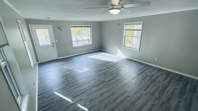 Building Photo - Charming Riverfront Rental in the Heart of...