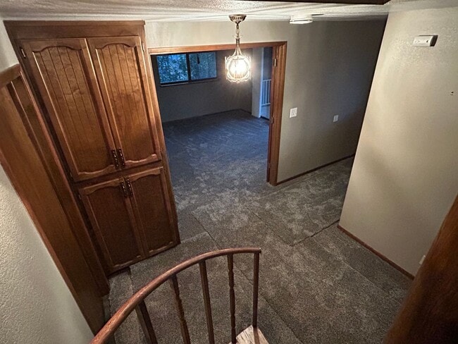 Building Photo - 6367 Woodman Dr