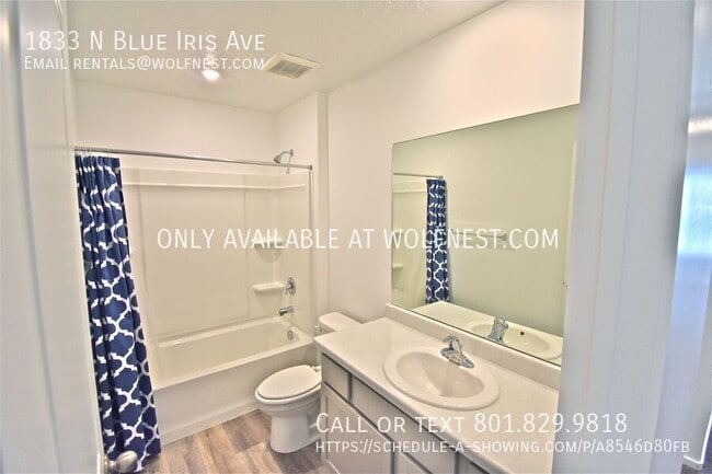 Building Photo - 1833 N Blue Iris Ave