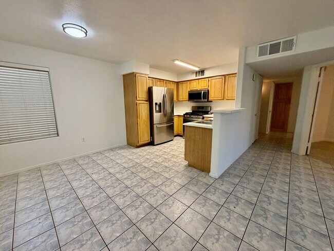 Building Photo - 5710 E Tropicana Ave