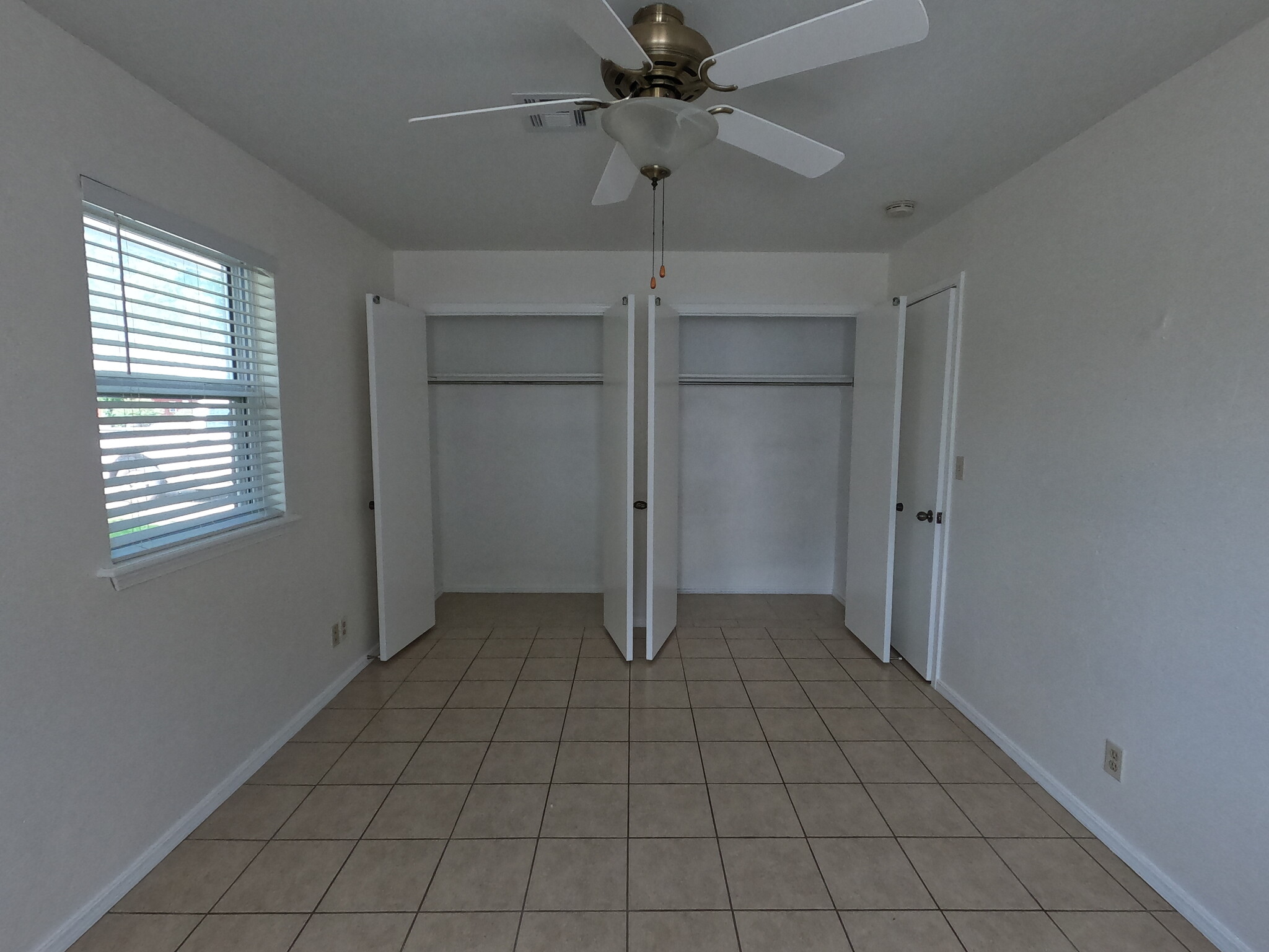 Double closets in primary bedroom - 415 W Guthrie St