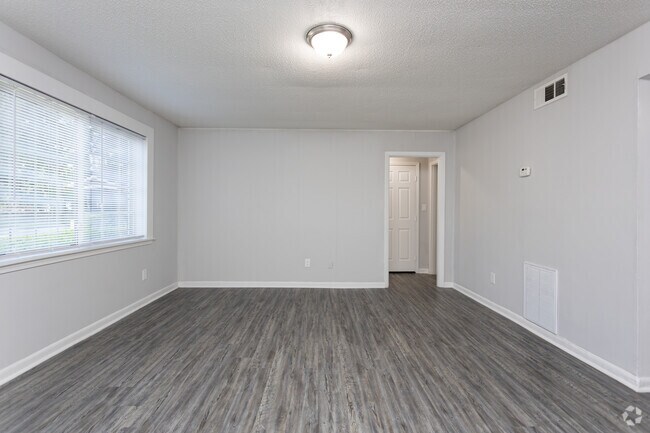 1BR, 1BA - 1,040SF - Living Room - Water Oak Village