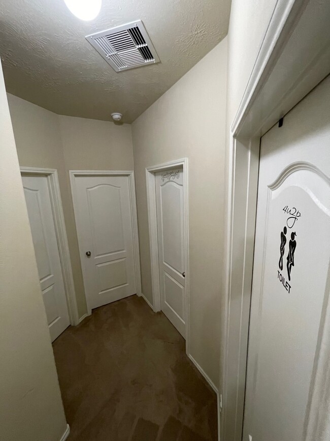 Hallway to the Rooms Split Floor Plan - 1939 Manor Dr