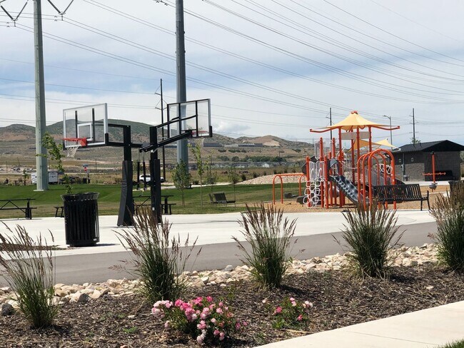 Building Photo - AMAZING HOME IN SOUGHT AFTER EXCHANGE DEVELOPMENT W/ 2 CAR GARAGE