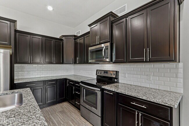 Building Photo - 6350 Escondido Dr
