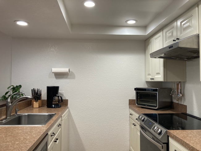 Looking into the kitchen from the hall. - 6 Lake Bellevue Dr