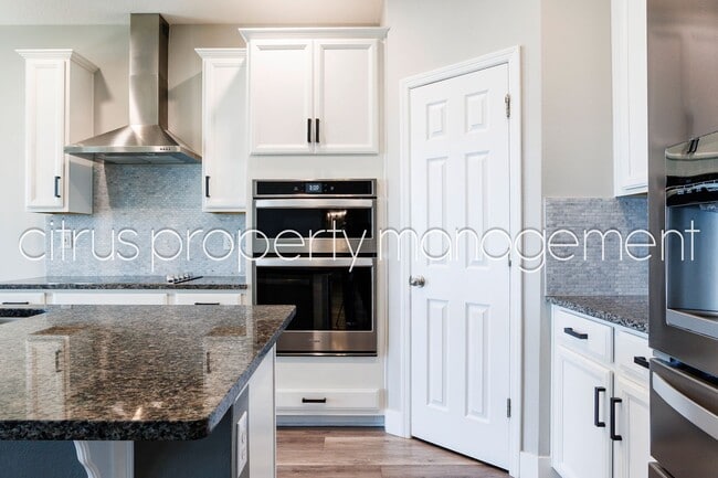 Building Photo - Stunning Double Waterfront 4/3 Home with Dock and Electric Boat Lift