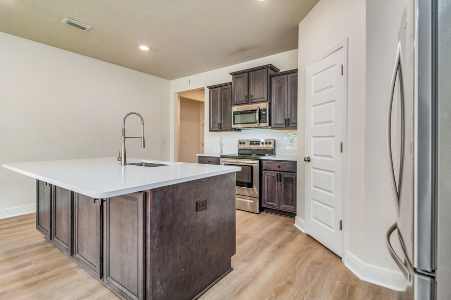 Kitchen with New Quartz Countertops - 5333 Talon Rd