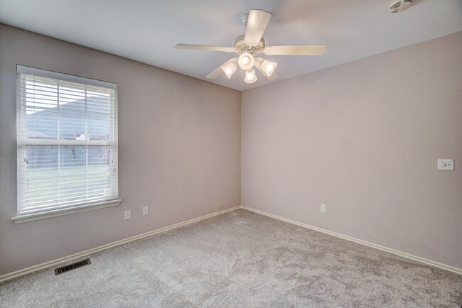 Building Photo - Spacious 4-Bedroom Home with Fireplace, Is...