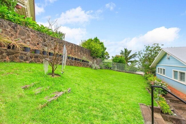 Building Photo - Charming 4-bedroom, 2-bathroom single-family home