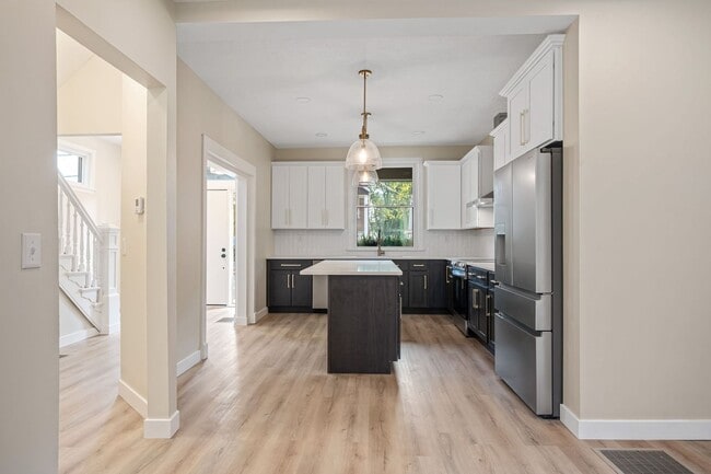 Building Photo - NORTHSIDE RARE GEM - FULLY RENOVATED 5+ BE...