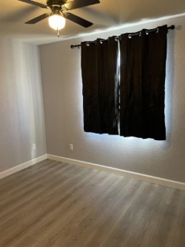 Building Photo - North side home, pet friendly with fenced back yard.