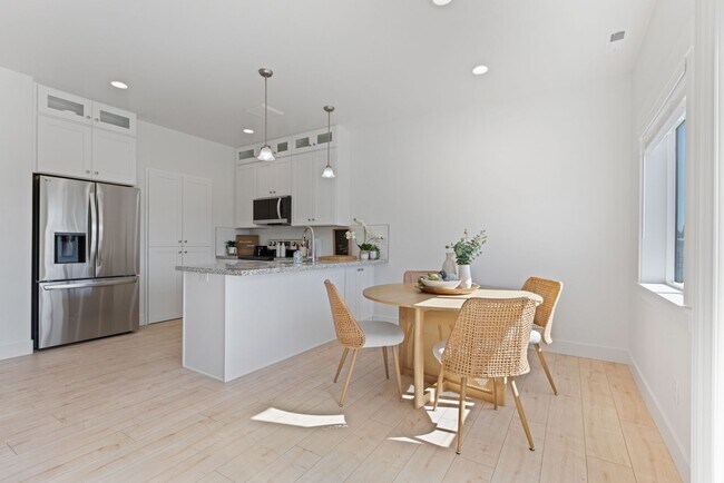 Building Photo - New St. Anthony Townhome with Unfinished Basement & Private Patio