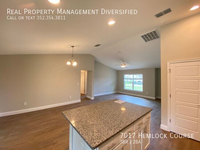 Building Photo - 7017 Hemlock Course