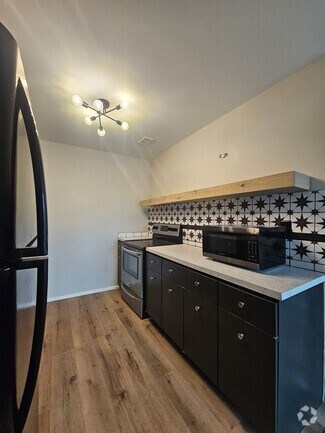 Building Photo - One Bedroom Midtown Condo