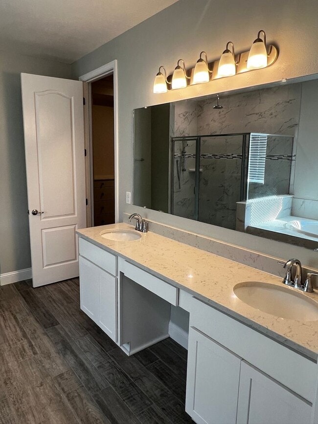 Building Photo - FOUR BEDROOMS and THREE BATHS For Rent