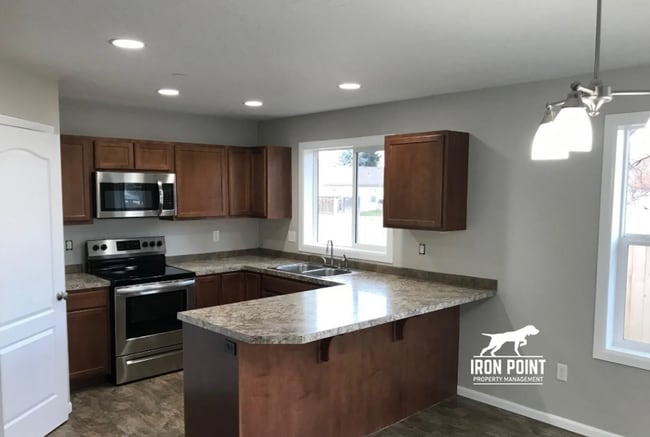 Building Photo - 3bed/2bath - Landscaping Included plus fenced yard, & two car garage.