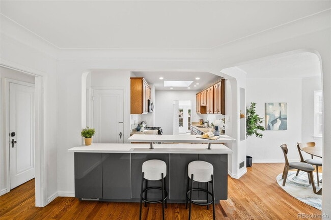 Building Photo - "Spacious 5-Bedroom Gem with Hardwood Floors & Cozy Fireplace in Denver's Heart!"