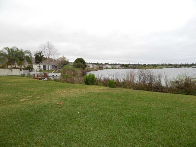 Building Photo - **Charming 4BR/2BA Pond-View Home with Boat Ramp Access – East Orlando **
