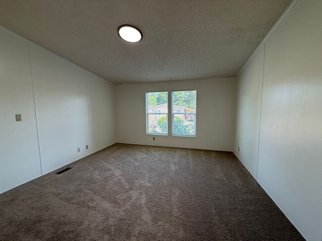 Building Photo - Welcome to Buxton Place – A Hidden Gem in Troutdale Offering Comfortable Homes, a Strong Sense of...