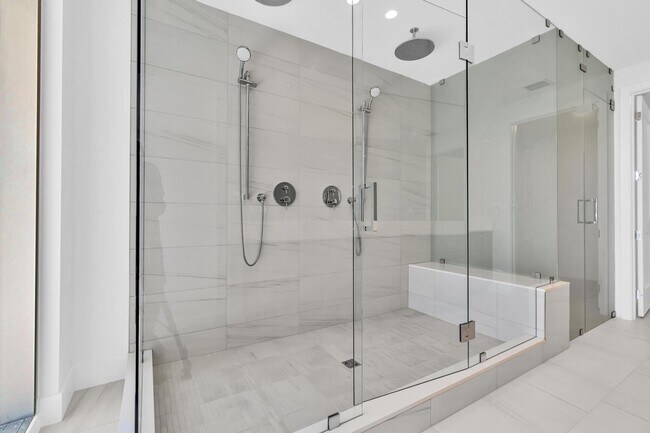 Building Photo - Stunning High-Rise Condo with Ocean Views | Prime Beach Location