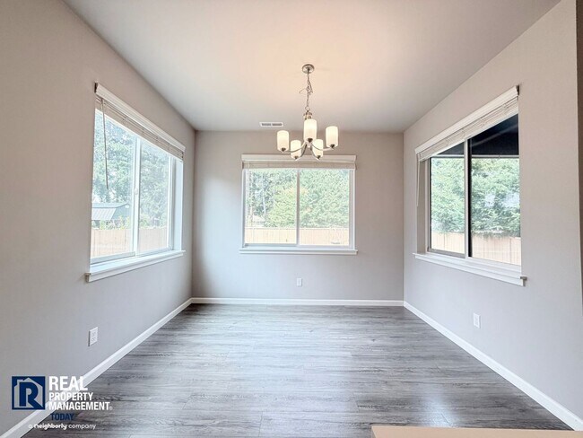 Building Photo - Easy JBLM Commute Like-New 4BR Home with 3-Car Garage & Bonus Office