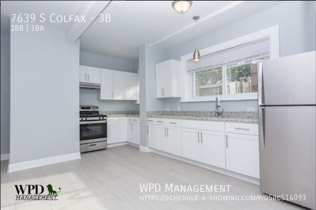 Building Photo - 7639 S Colfax-3B